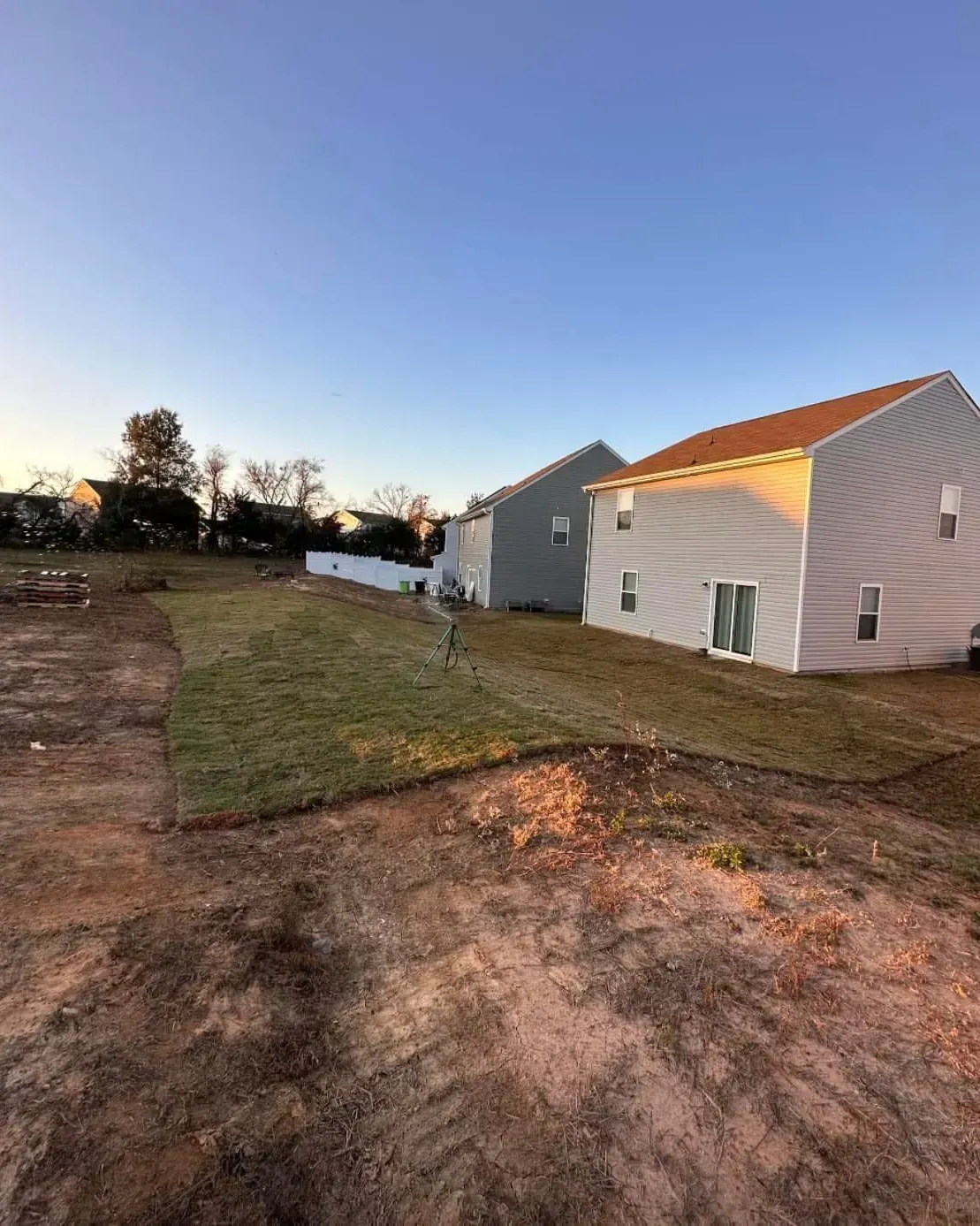 Residential yard during sod installation