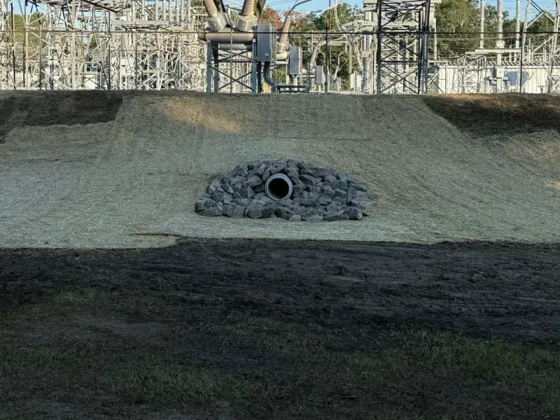 Storm pipe outlet set in rock on a slope